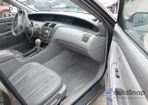 2003 Toyota Avalon Xl z USA, uszkodzony, nr VIN 4T1BF28B93U287520